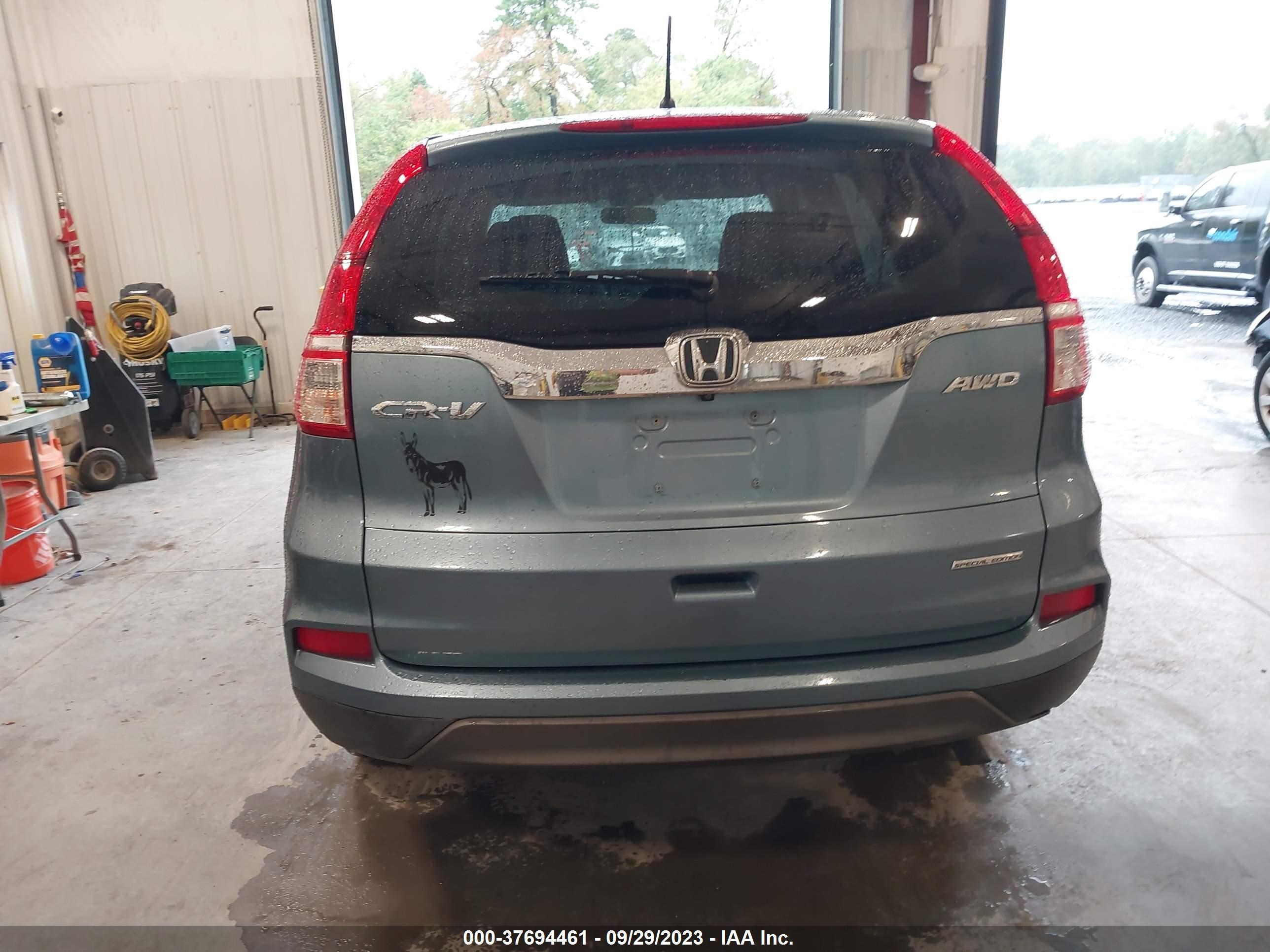 Photo 15 VIN: 2HKRM4H49GH690175 - HONDA CR-V 