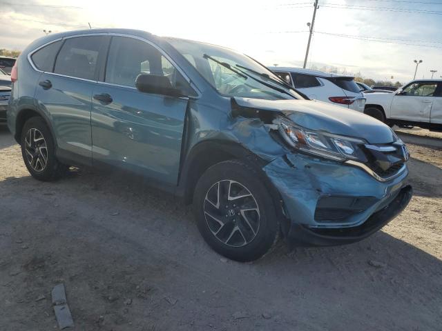 Photo 3 VIN: 2HKRM4H49GH720601 - HONDA CR-V SE 