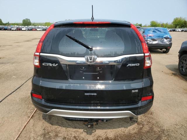 Photo 5 VIN: 2HKRM4H4XGH118399 - HONDA CR-V SE 
