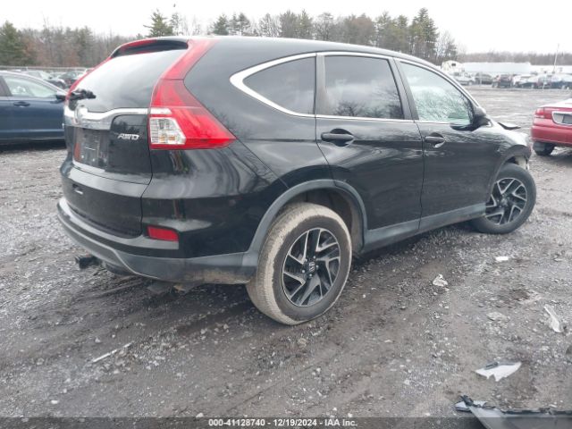 Photo 3 VIN: 2HKRM4H4XGH629076 - HONDA CR-V 