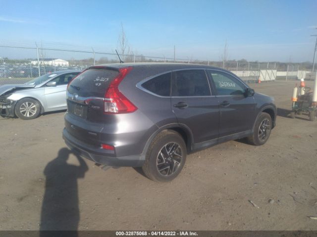 Photo 3 VIN: 2HKRM4H4XGH705265 - HONDA CR-V 