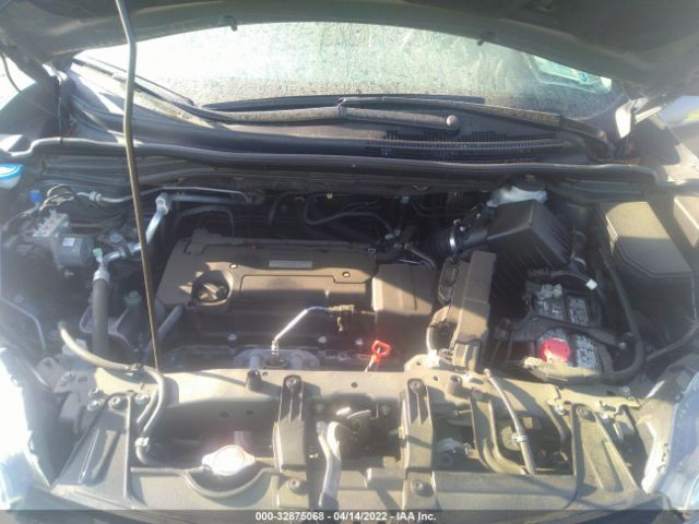 Photo 9 VIN: 2HKRM4H4XGH705265 - HONDA CR-V 