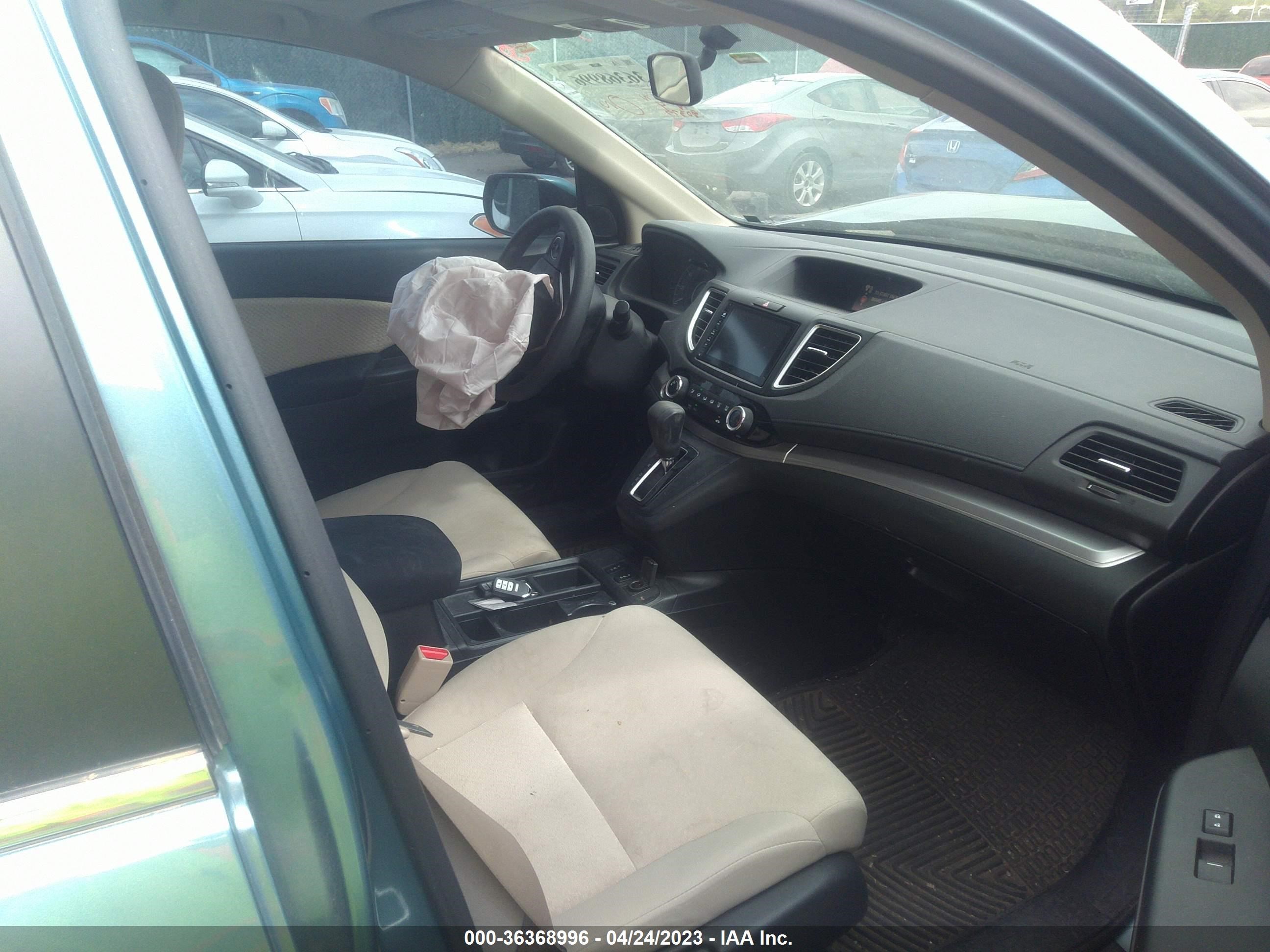 Photo 4 VIN: 2HKRM4H50FH665950 - HONDA CR-V 