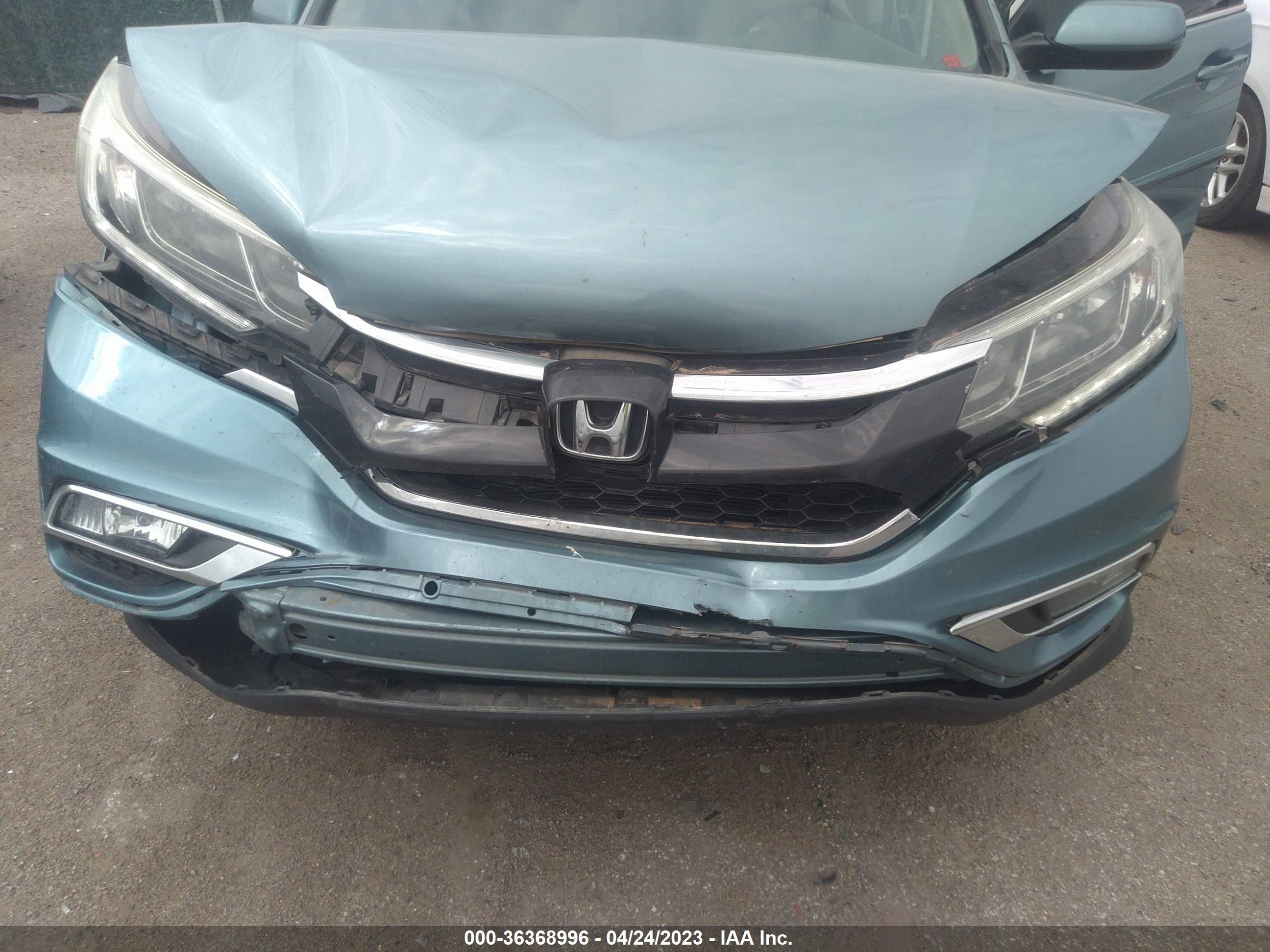 Photo 5 VIN: 2HKRM4H50FH665950 - HONDA CR-V 