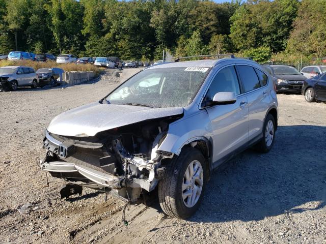 Photo 1 VIN: 2HKRM4H50GH649409 - HONDA CR-V EX 