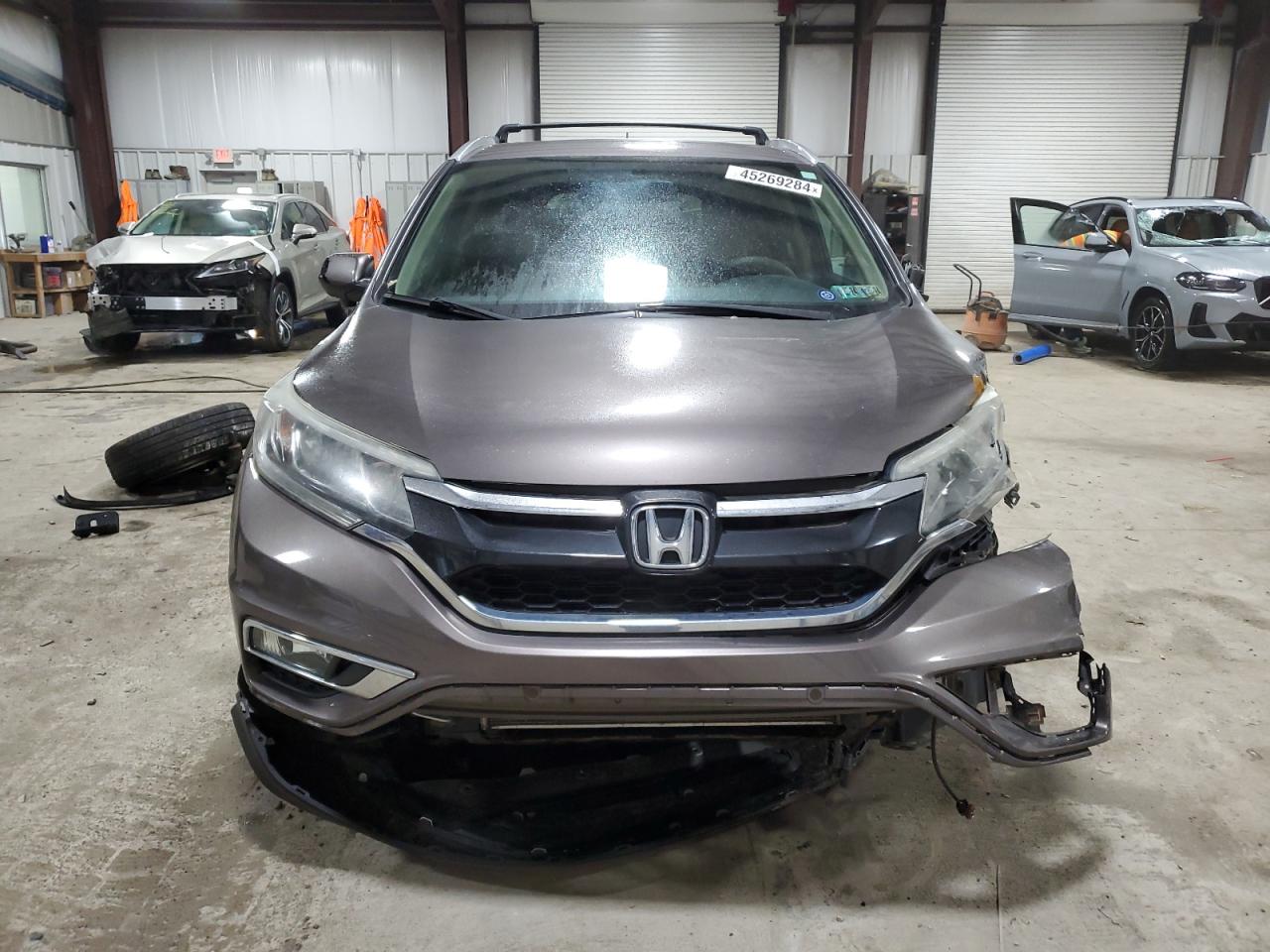 Photo 4 VIN: 2HKRM4H51FH664662 - HONDA CR-V 