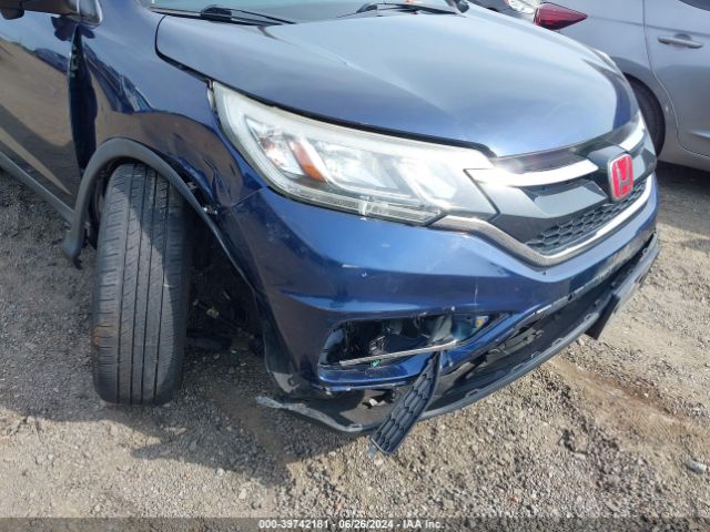 Photo 5 VIN: 2HKRM4H52GH725714 - HONDA CR-V 