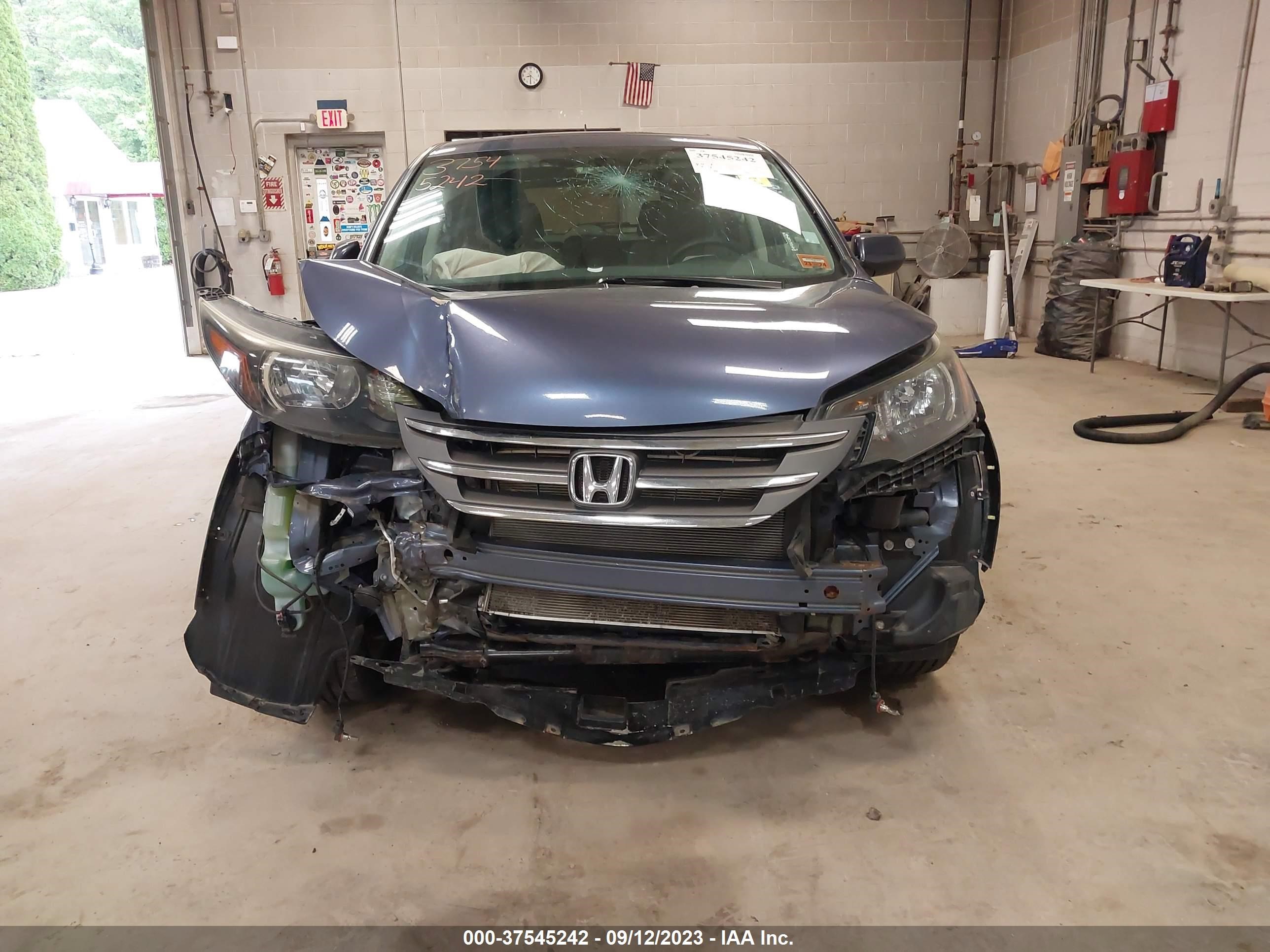 Photo 12 VIN: 2HKRM4H56EH692181 - HONDA CR-V 