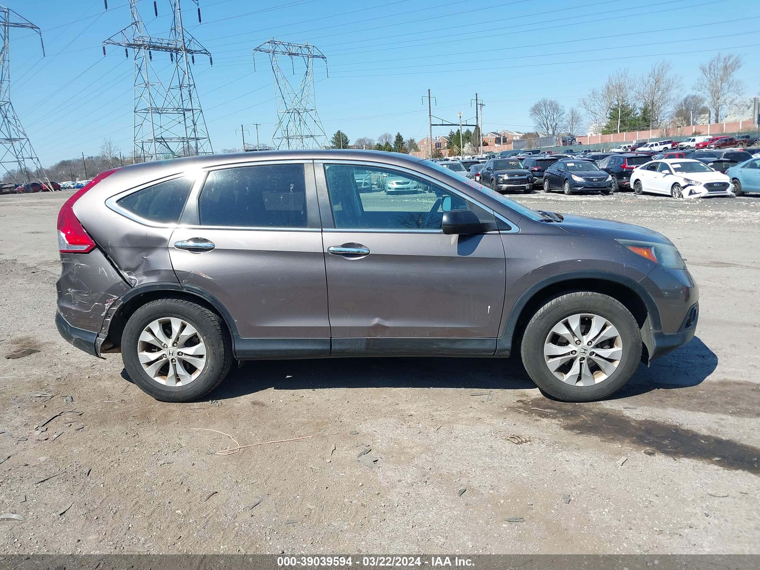 Photo 12 VIN: 2HKRM4H57EH657049 - HONDA CR-V 