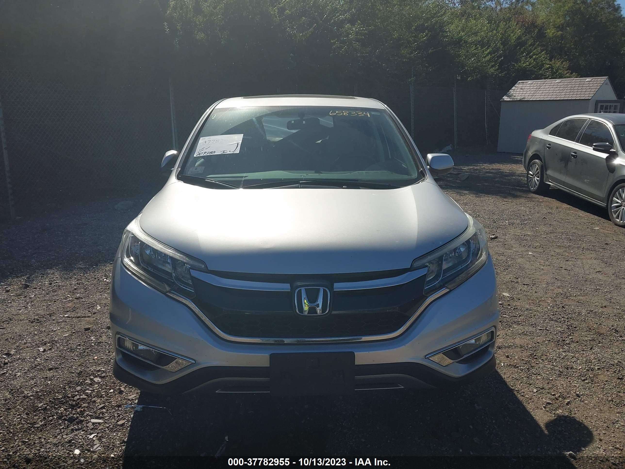 Photo 11 VIN: 2HKRM4H57GH658334 - HONDA CR-V 