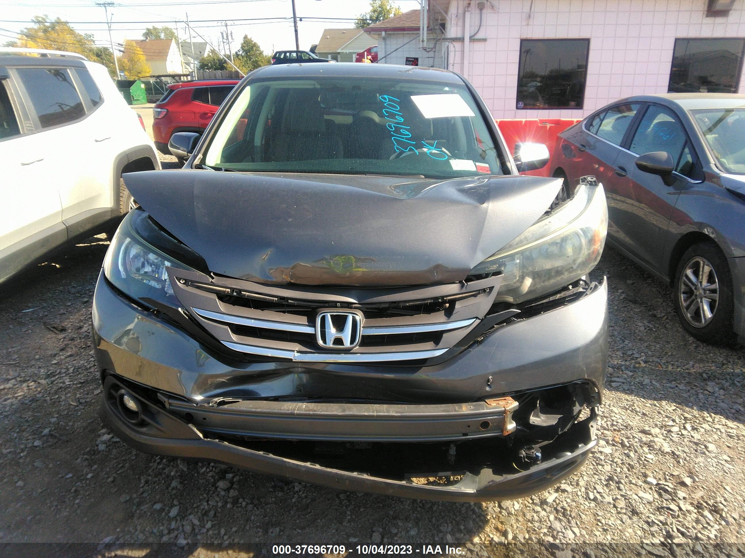 Photo 11 VIN: 2HKRM4H58EH657416 - HONDA CR-V 