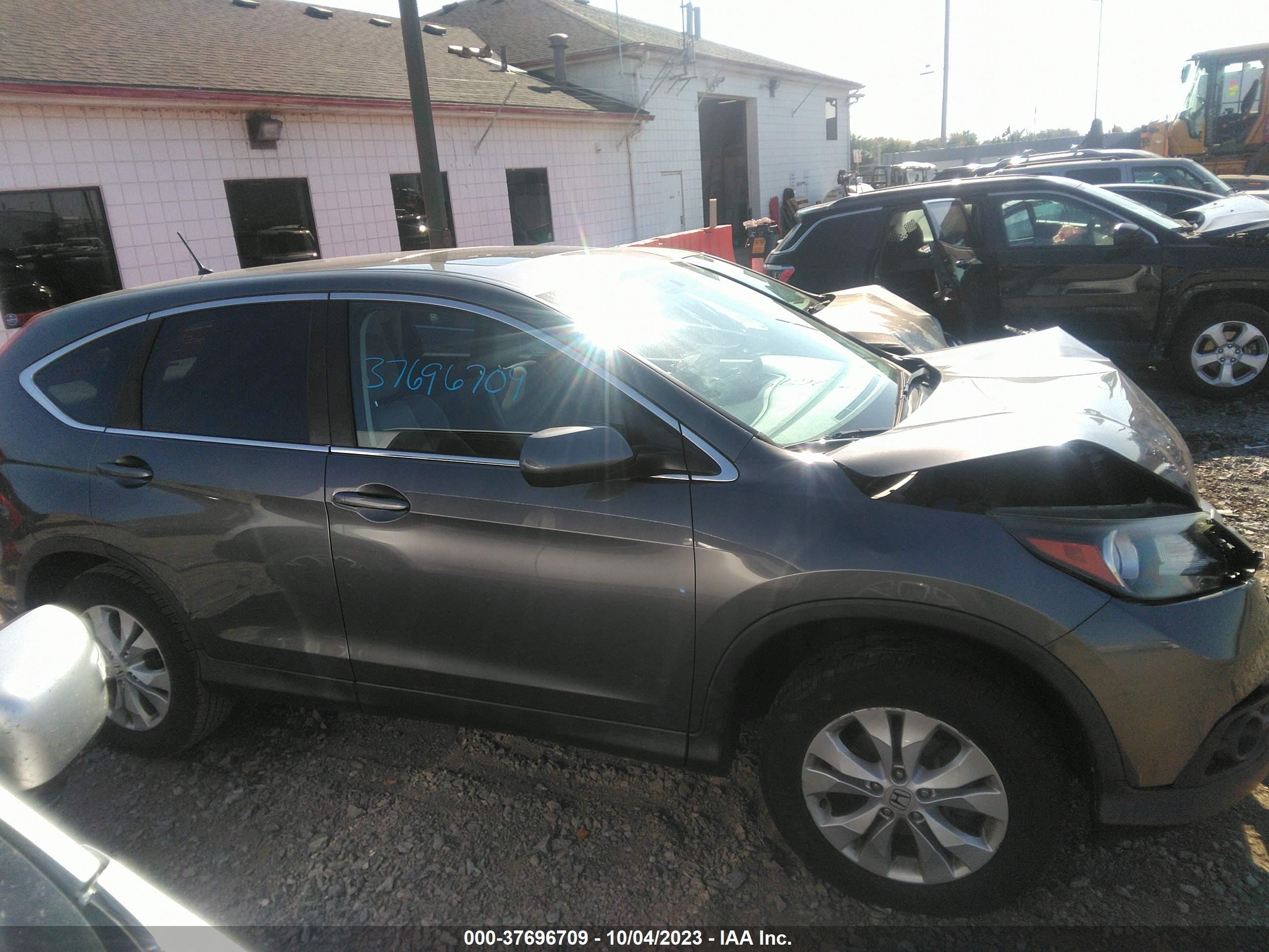 Photo 12 VIN: 2HKRM4H58EH657416 - HONDA CR-V 