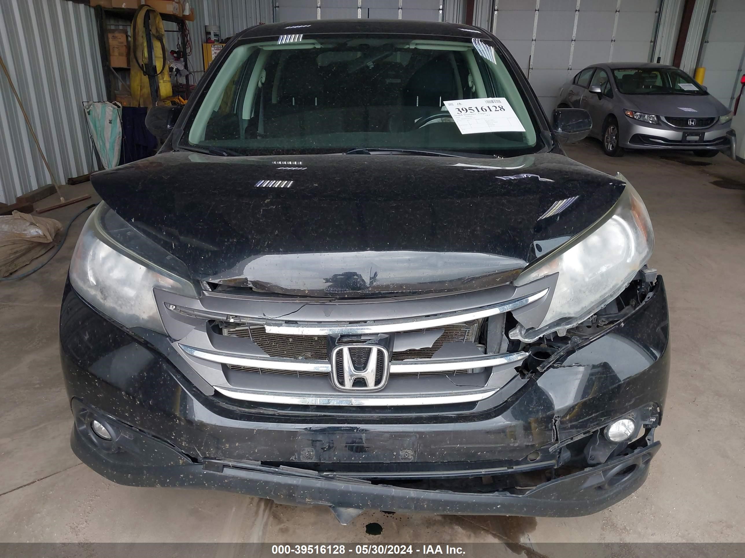 Photo 5 VIN: 2HKRM4H5XCH612569 - HONDA CR-V 