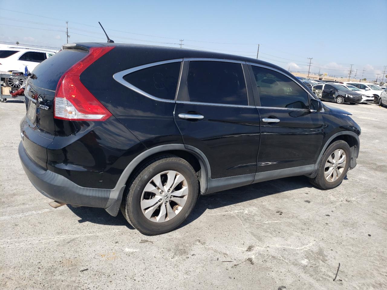 Photo 2 VIN: 2HKRM4H5XCH625063 - HONDA CRV 