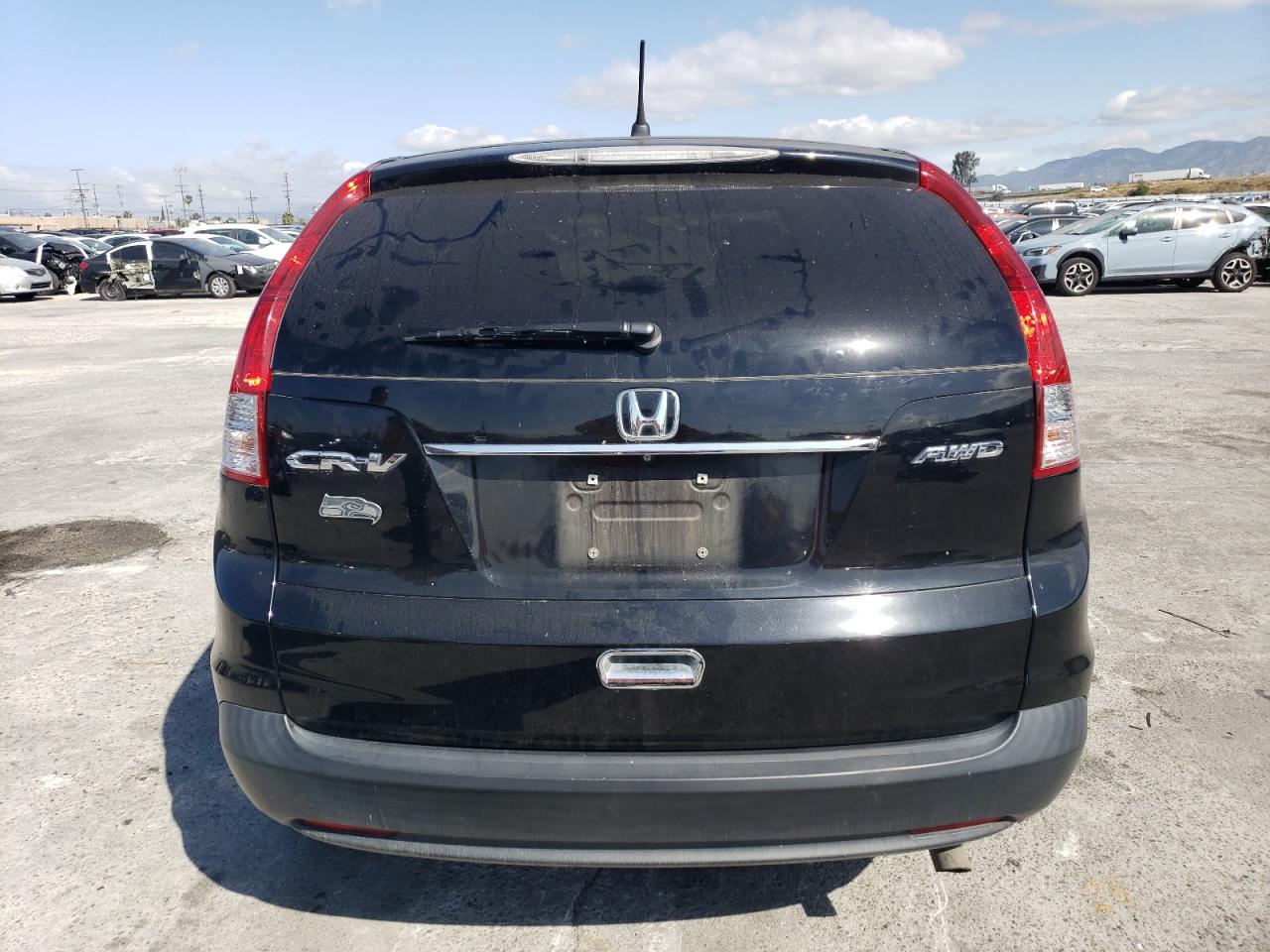 Photo 5 VIN: 2HKRM4H5XCH625063 - HONDA CRV 