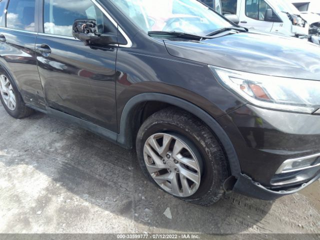 Photo 5 VIN: 2HKRM4H5XGH602632 - HONDA CR-V 