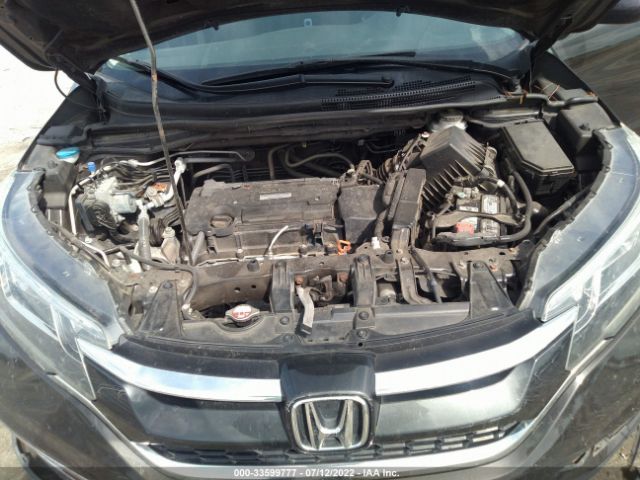 Photo 9 VIN: 2HKRM4H5XGH602632 - HONDA CR-V 