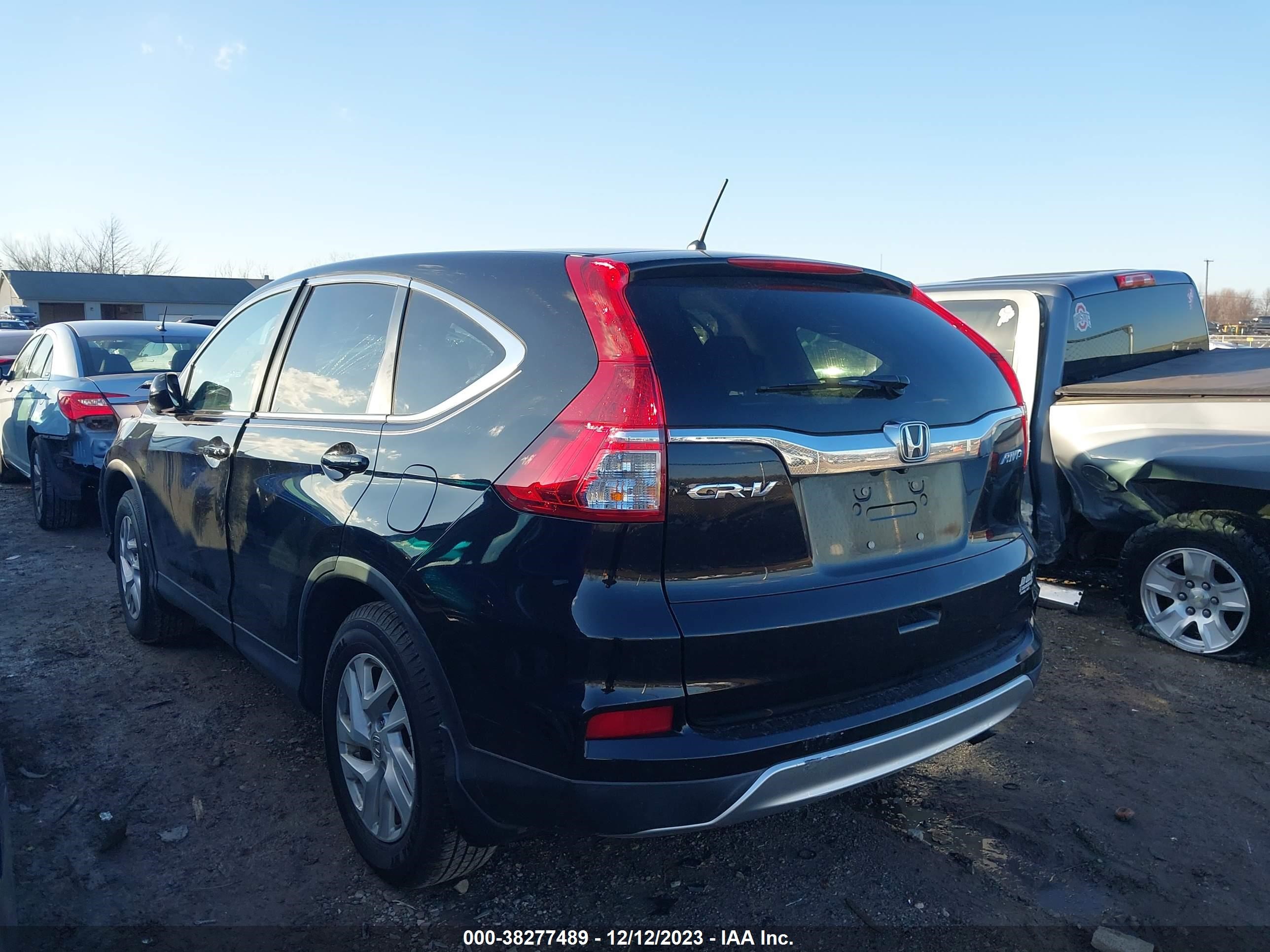 Photo 2 VIN: 2HKRM4H5XGH653399 - HONDA CR-V 