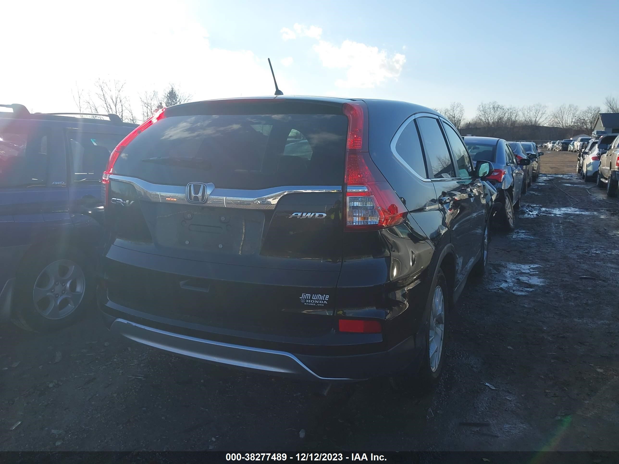 Photo 3 VIN: 2HKRM4H5XGH653399 - HONDA CR-V 