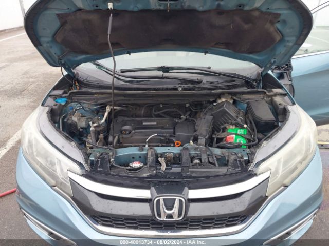 Photo 9 VIN: 2HKRM4H5XGH688380 - HONDA CR-V 