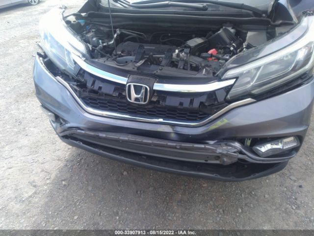 Photo 5 VIN: 2HKRM4H5XGH704254 - HONDA CR-V 