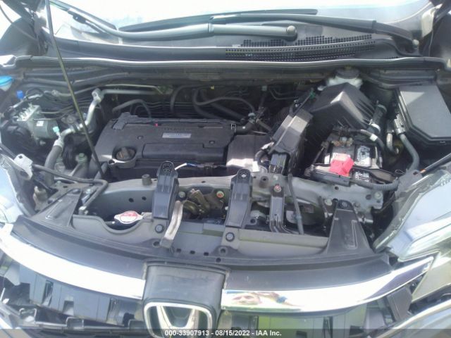 Photo 9 VIN: 2HKRM4H5XGH704254 - HONDA CR-V 