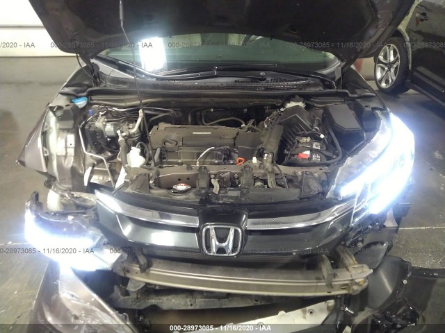 Photo 9 VIN: 2HKRM4H5XGH713276 - HONDA CR-V 