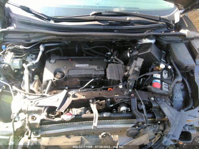 Photo 9 VIN: 2HKRM4H5XGH717053 - HONDA CR-V 