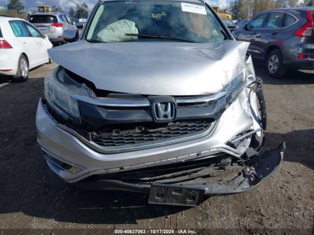 Photo 5 VIN: 2HKRM4H72GH677147 - HONDA CR-V 