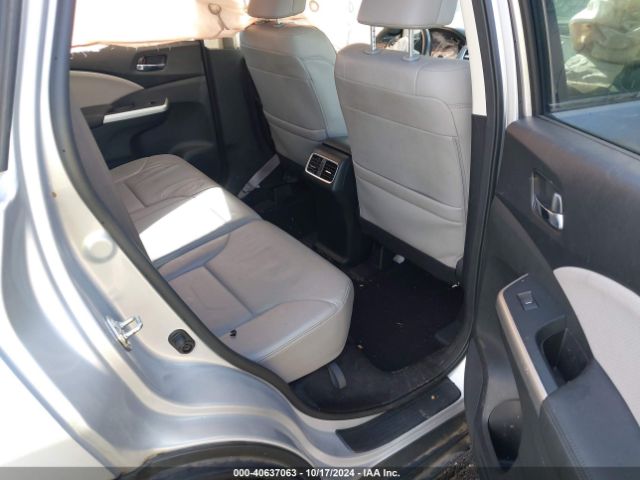 Photo 7 VIN: 2HKRM4H72GH677147 - HONDA CR-V 