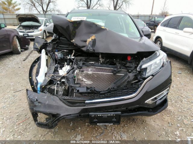 Photo 5 VIN: 2HKRM4H72GH717243 - HONDA CR-V 