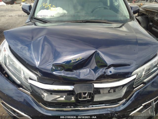 Photo 9 VIN: 2HKRM4H73FH675082 - HONDA CR-V 