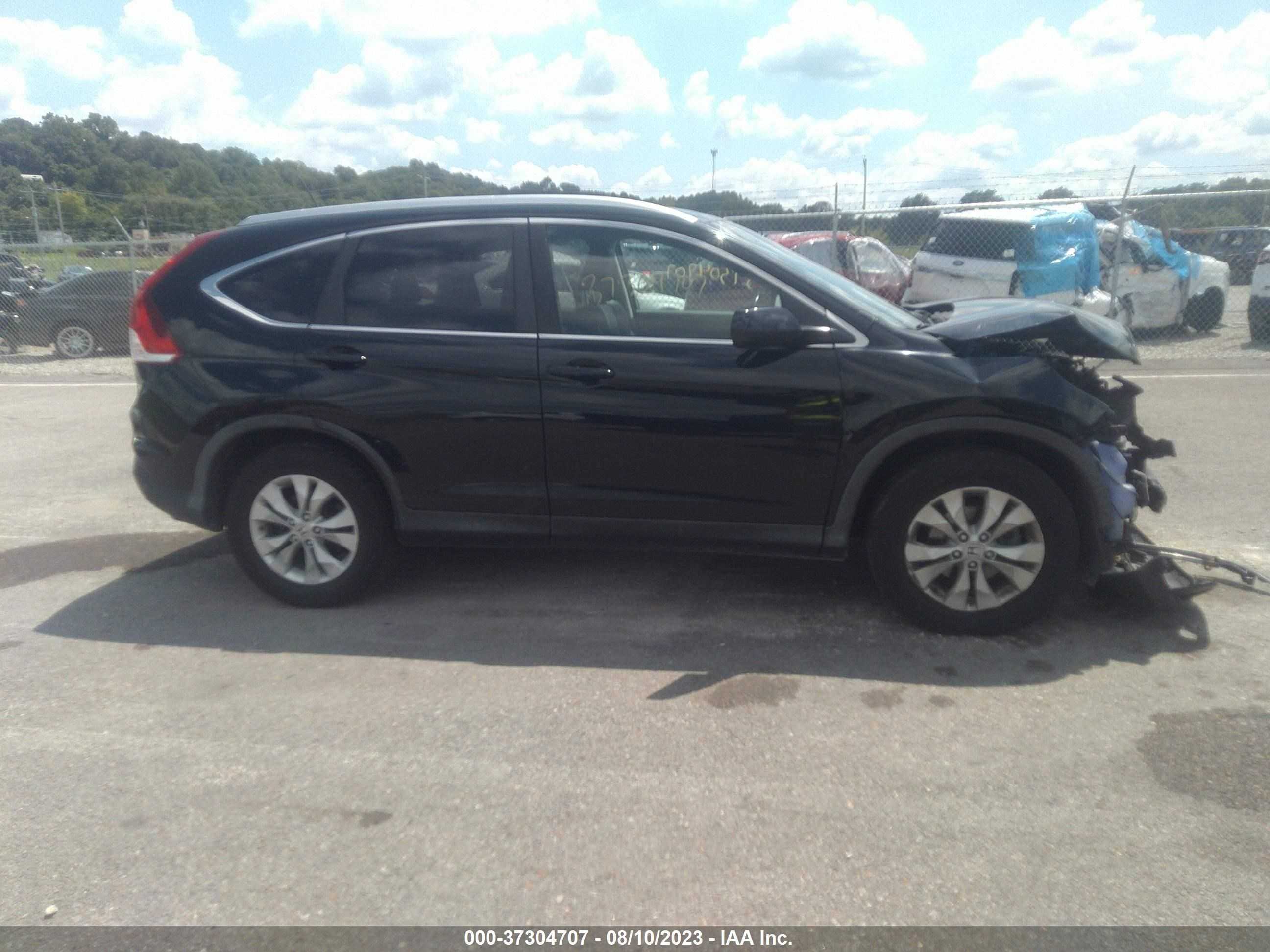 Photo 12 VIN: 2HKRM4H74DH644128 - HONDA CR-V 