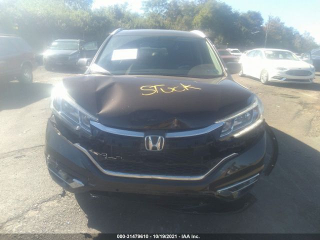 Photo 5 VIN: 2HKRM4H74GH638639 - HONDA CR-V 