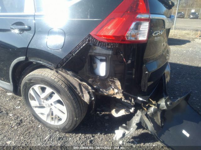 Photo 5 VIN: 2HKRM4H74GH671334 - HONDA CR-V 