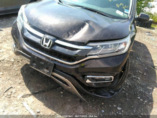 Photo 5 VIN: 2HKRM4H74GH700850 - HONDA CR-V 