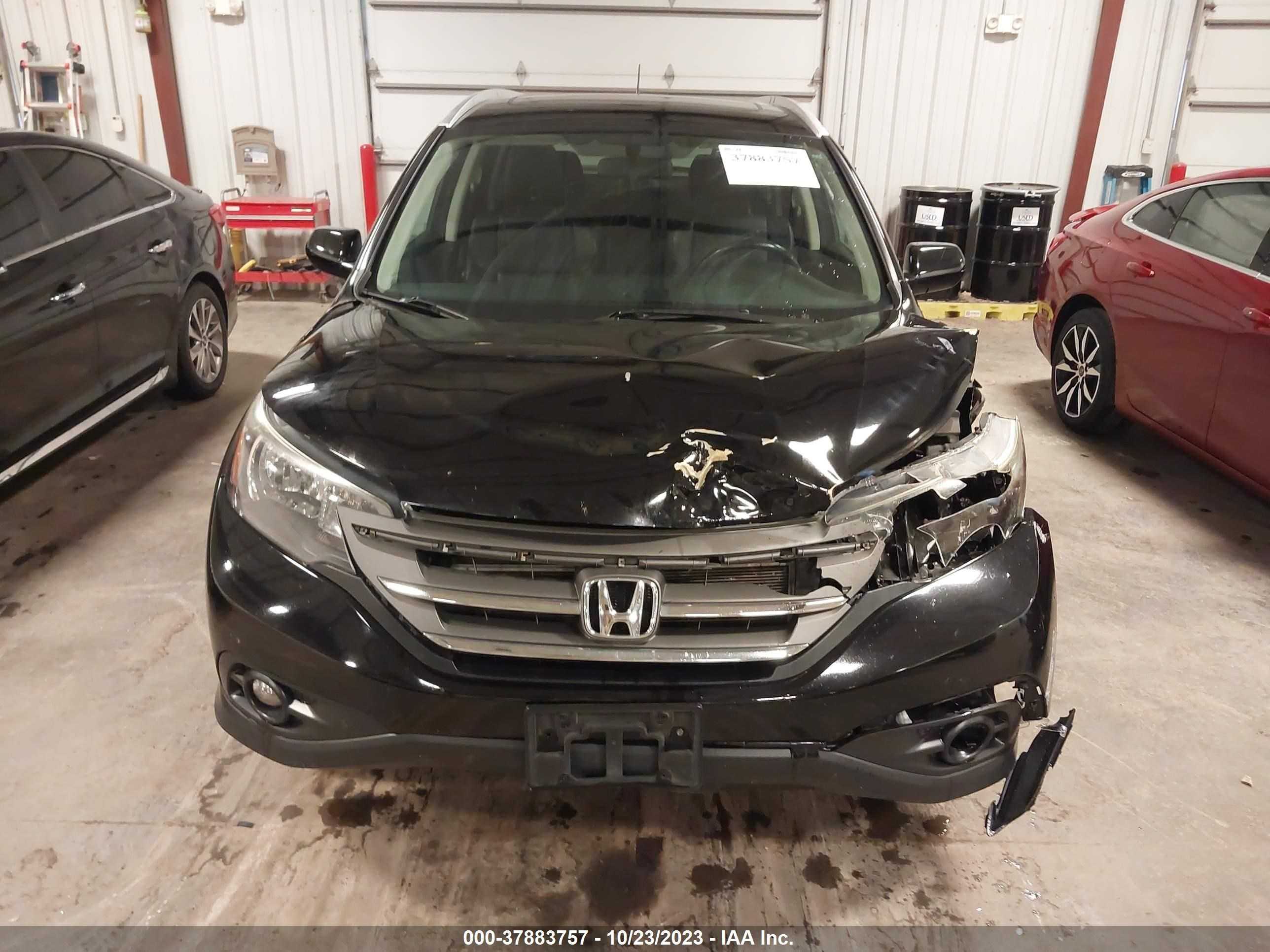 Photo 12 VIN: 2HKRM4H75DH661438 - HONDA CR-V 