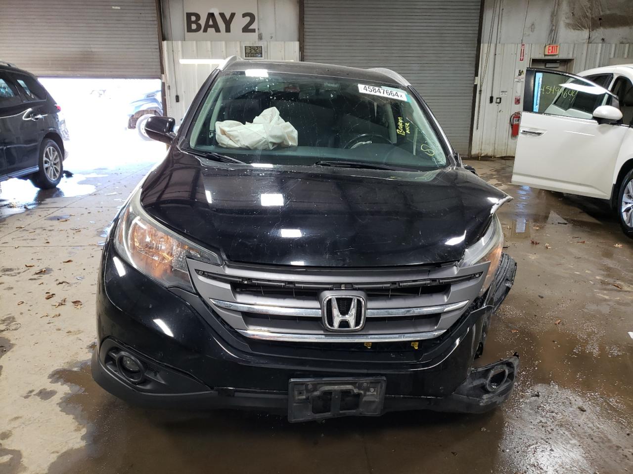 Photo 4 VIN: 2HKRM4H75EH700949 - HONDA CR-V 