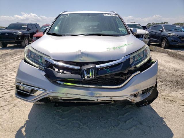 Photo 4 VIN: 2HKRM4H75GH679636 - HONDA CRV 