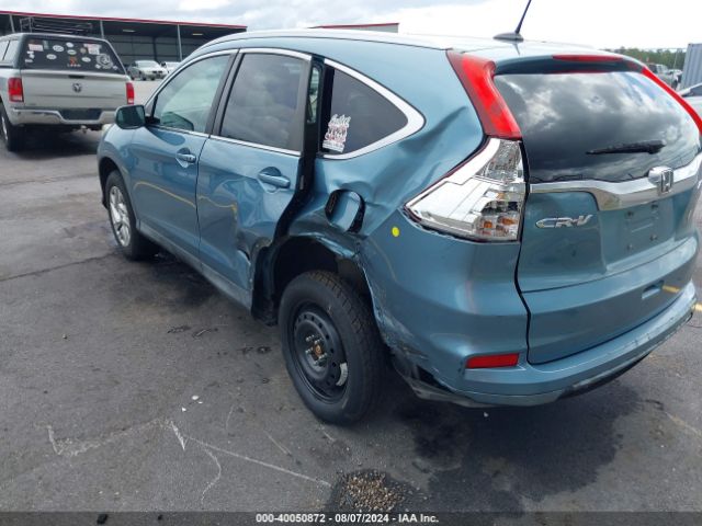 Photo 5 VIN: 2HKRM4H77FH673058 - HONDA CR-V 