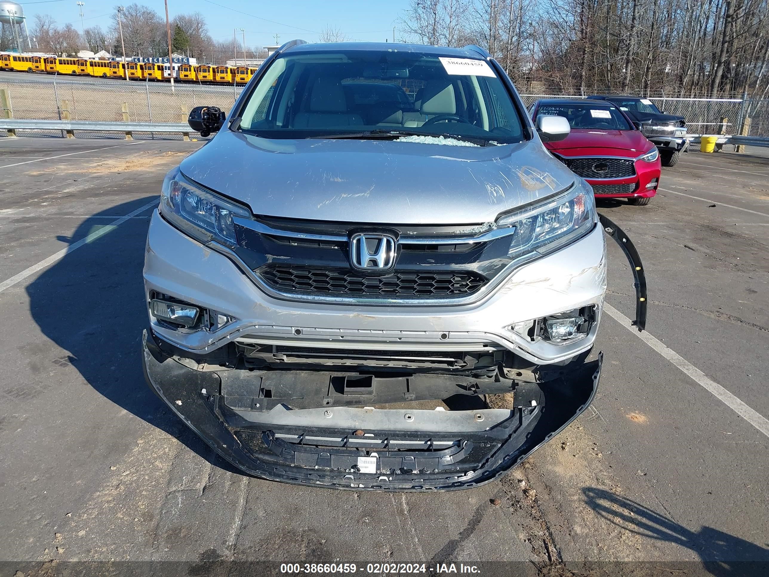 Photo 12 VIN: 2HKRM4H78FH647102 - HONDA CR-V 