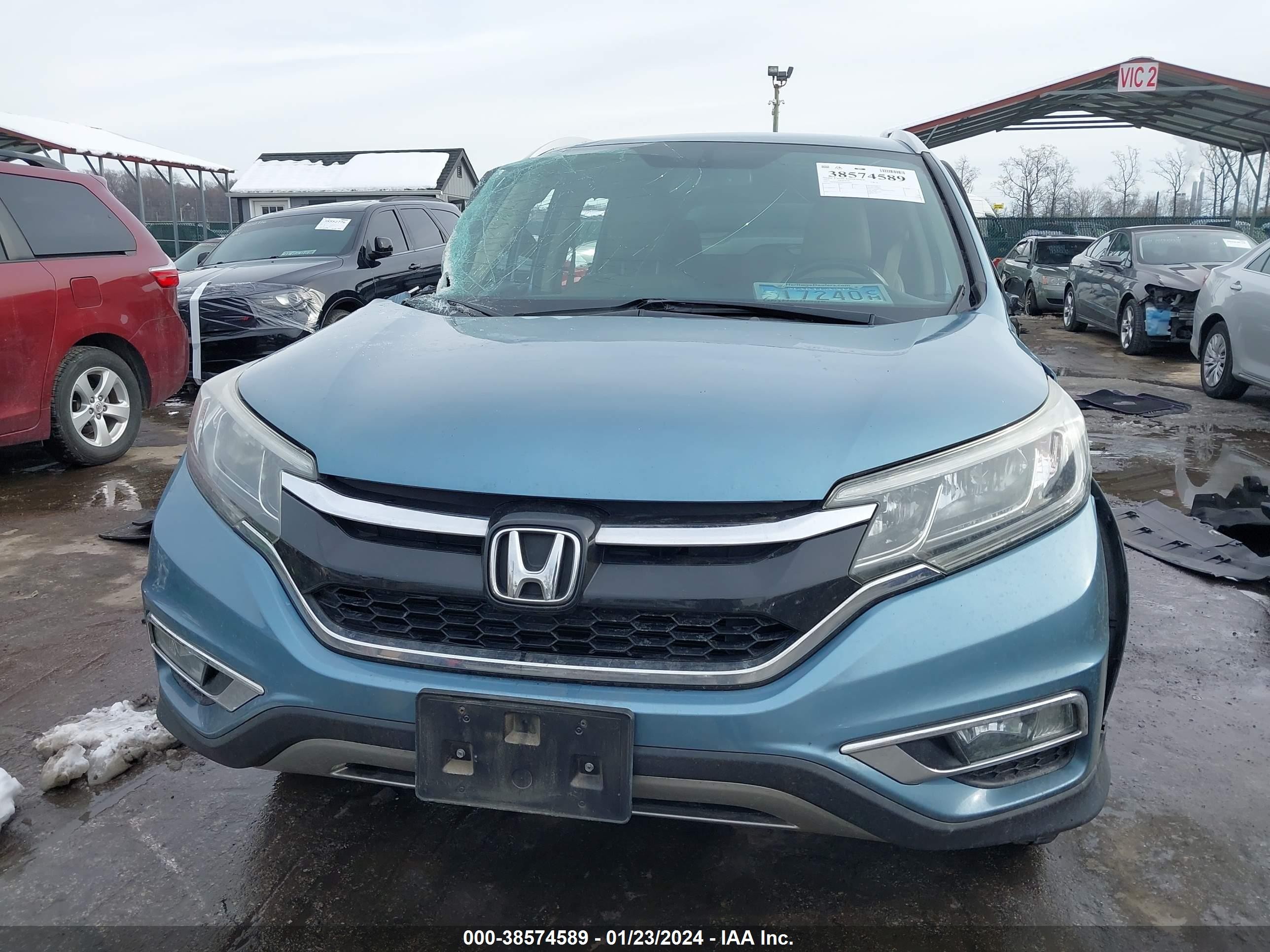 Photo 12 VIN: 2HKRM4H79FH672803 - HONDA CR-V 