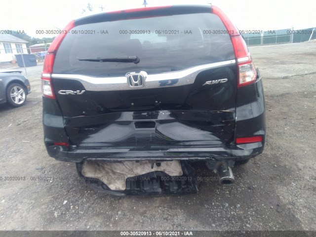 Photo 5 VIN: 2HKRM4H79FH676060 - HONDA CR-V 