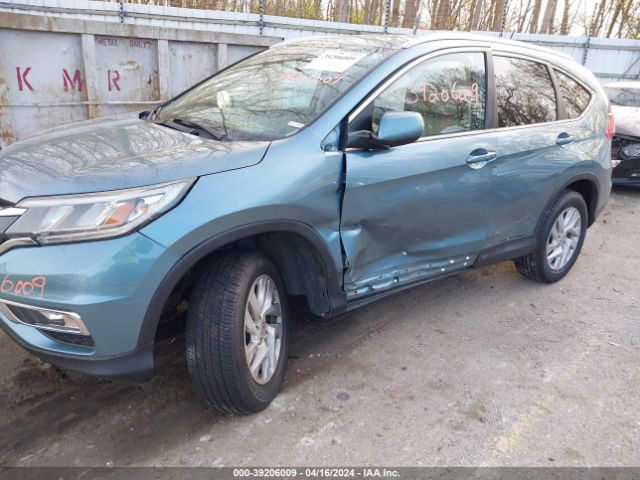 Photo 5 VIN: 2HKRM4H7XGH634398 - HONDA CR-V 