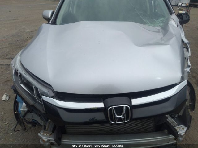 Photo 9 VIN: 2HKRM4H7XGH713702 - HONDA CR-V 