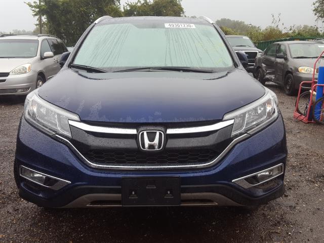 Photo 8 VIN: 2HKRM4H7XGH714977 - HONDA CR-V 