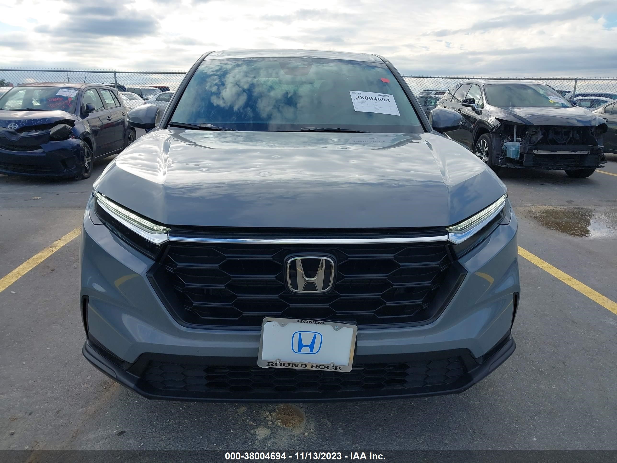 Photo 11 VIN: 2HKRS3H20RH302266 - HONDA CR-V 