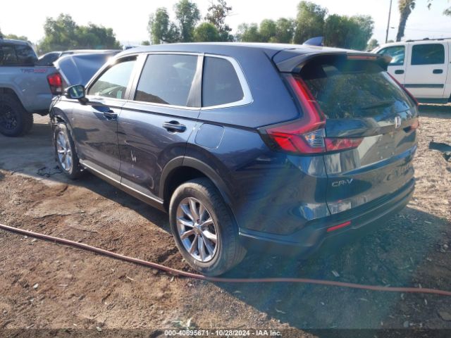 Photo 2 VIN: 2HKRS3H71PH304651 - HONDA CR-V 