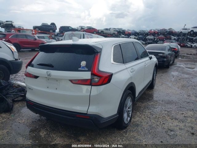 Photo 3 VIN: 2HKRS3H74PH305115 - HONDA CR-V 