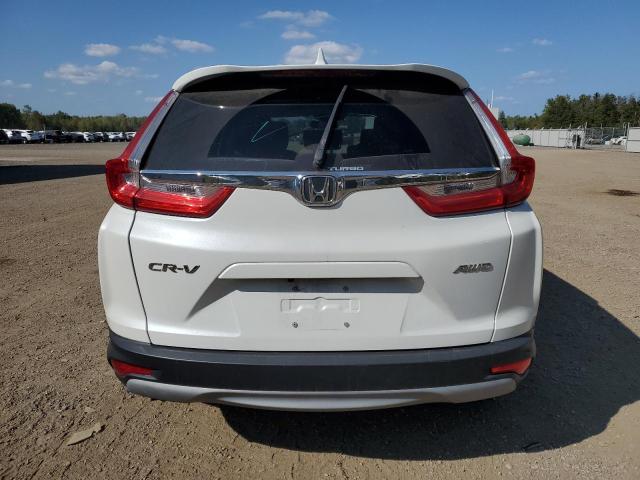 Photo 5 VIN: 2HKRW2H25KH122379 - HONDA CR-V LX 